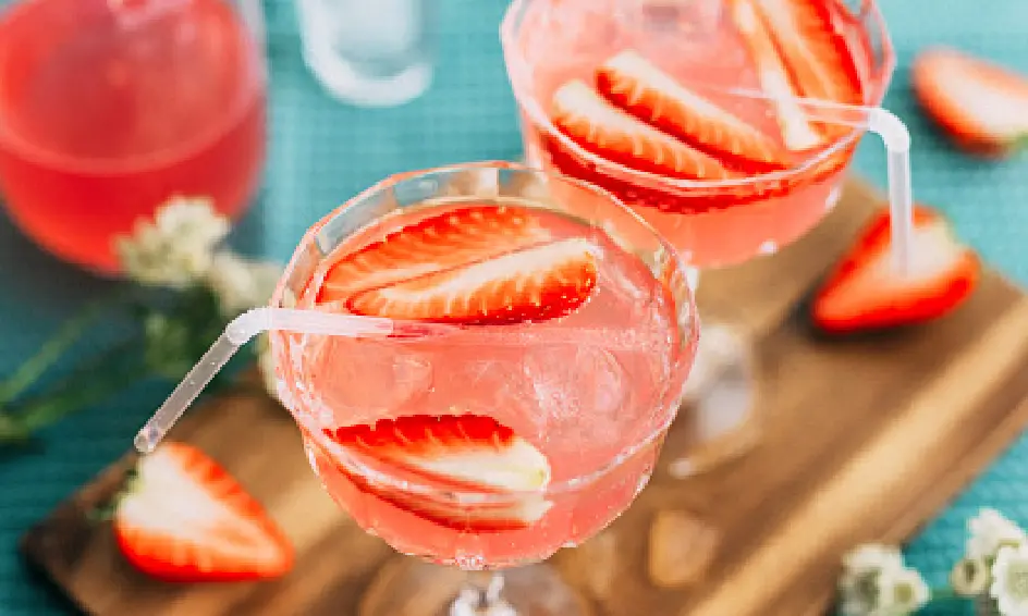 Bright strawberry cocktails with straw